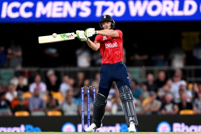 Jos Buttler of England hits the ball over the boundary for a six 