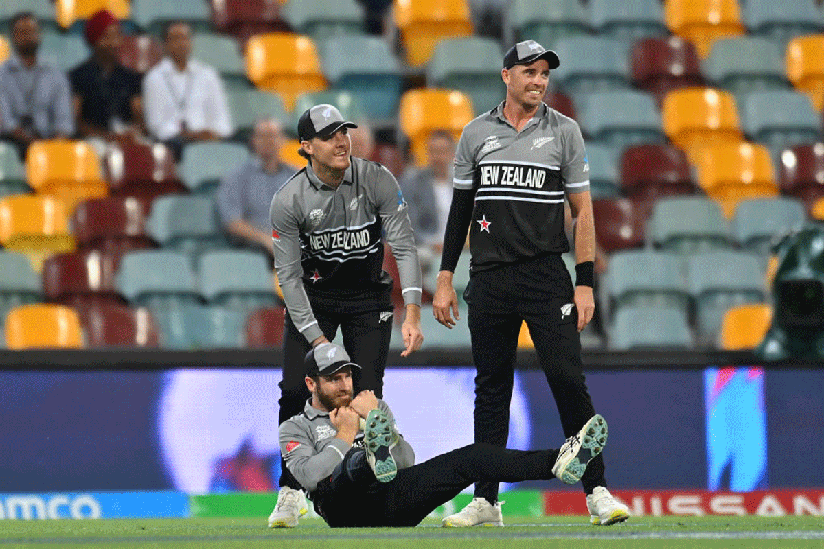 Kane Williamson reacts with team mates after he appeared to have caught out Jos Buttler during their T20 World Cup match at The Gabba in Brisbane, Australia, on Tuesday