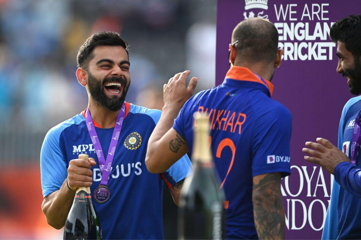 Virat Kohli shares a joke with Shikhar Dhawan