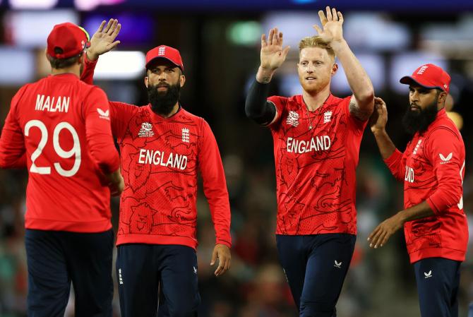 Ben Stokes celebrates with teammates after dismissing Charith Asalanka.