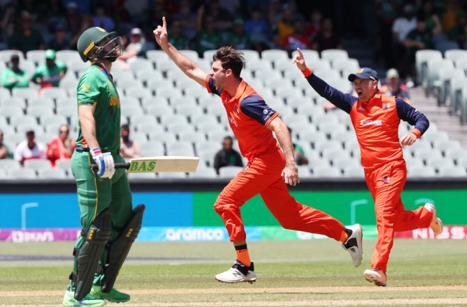  The Netherlands seamer Brandon Glover, who had figures of 3 for 9 from two overs, celebrates dismissing Wayne Parnell for a duck