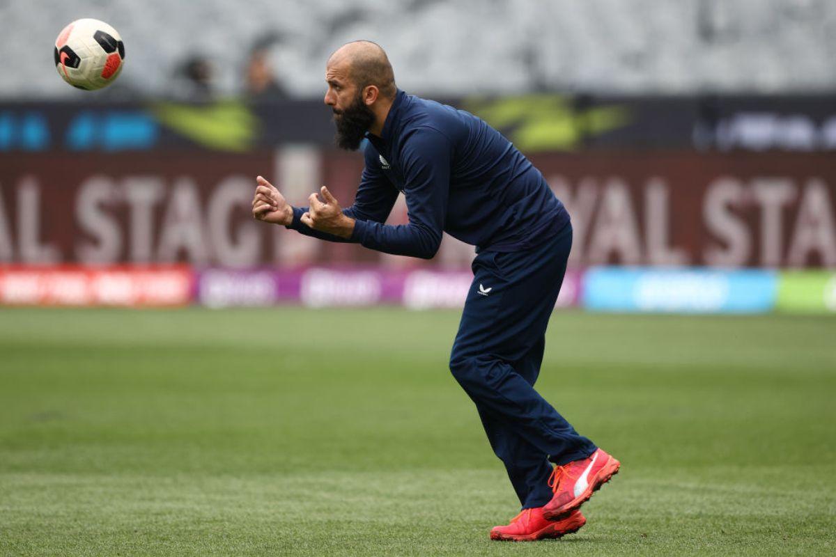 Moeen Ali of England warms up