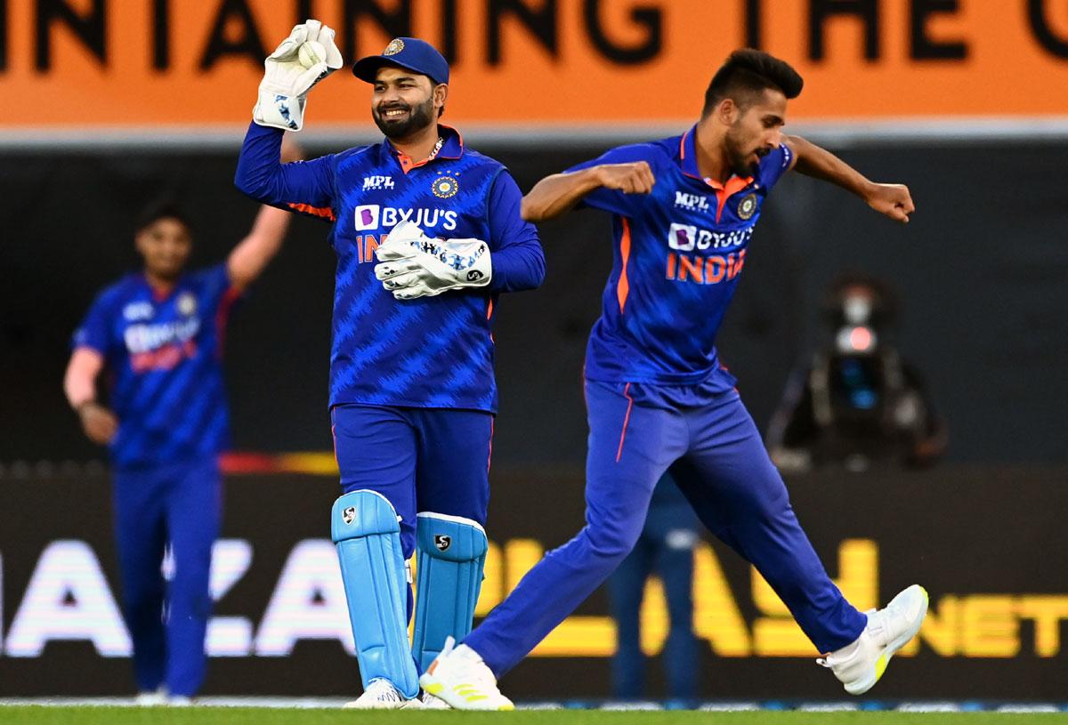 Pacer Umran Malik, who made his India ODI debut, celebrates the wicket of Devon Conway.