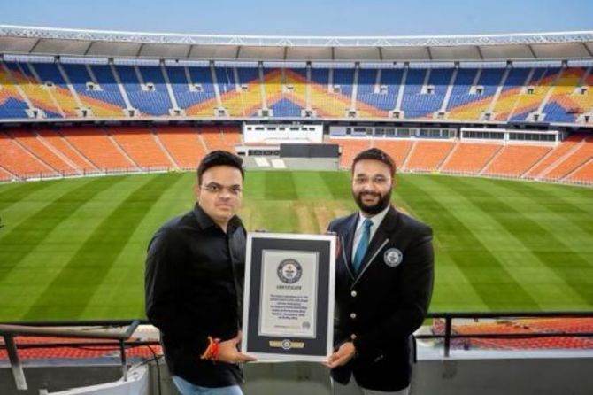 BCCI secretary Jay Shah receiving the record from Guinness
