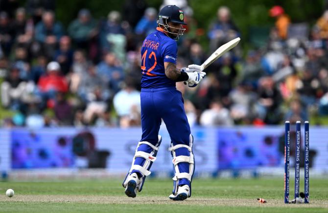 India opener Shikhar Dhawan is bowled by Adam Milne.