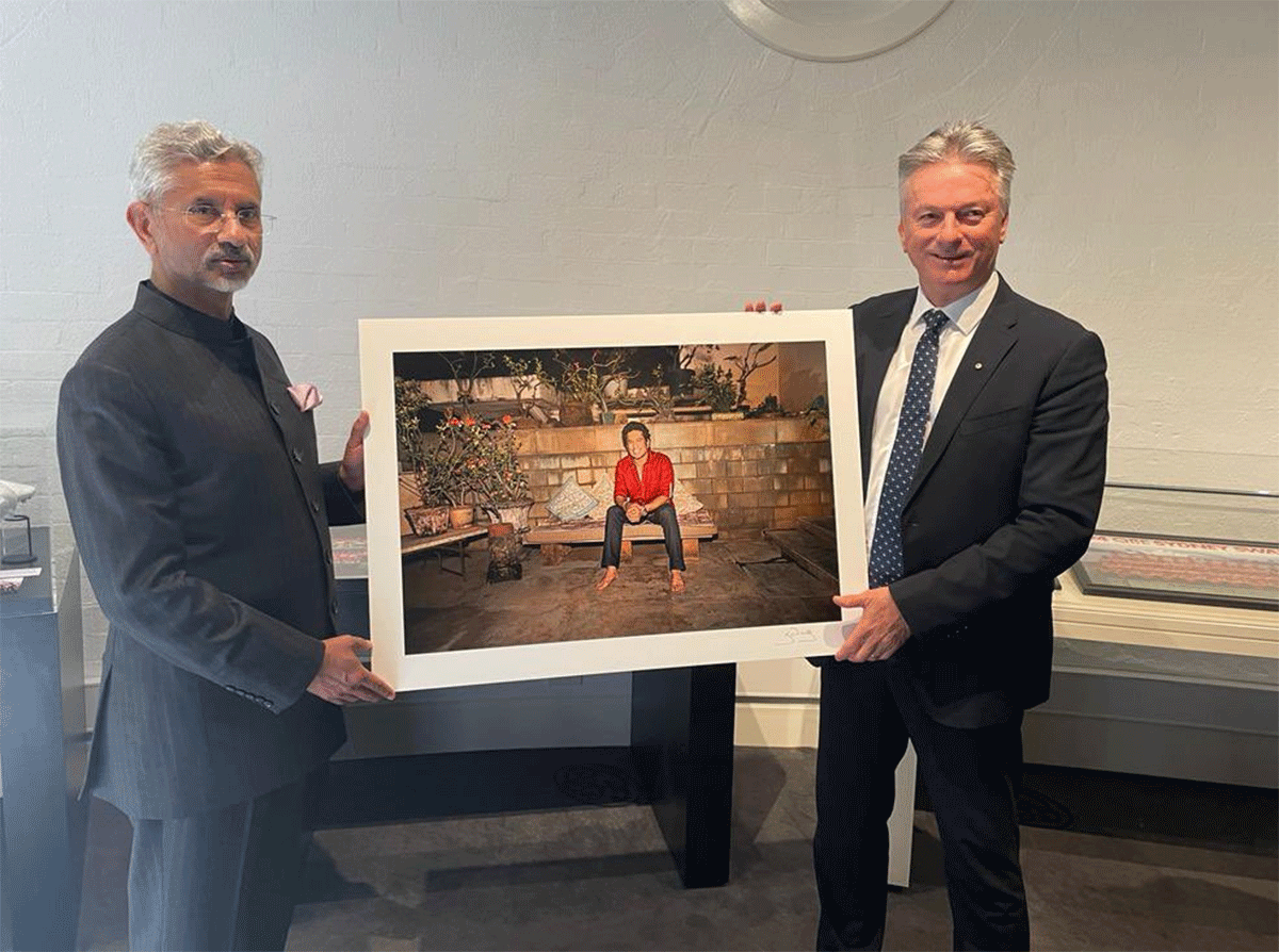 Jaishankar and Waugh with a photo of the master blaster