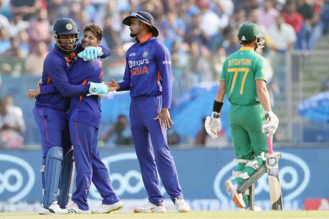 ndia's Kuldeep Yadav celebrates the dismissal of South Africa's Bjorn Fortuin during the 3rd ODI match between India and South Africa,