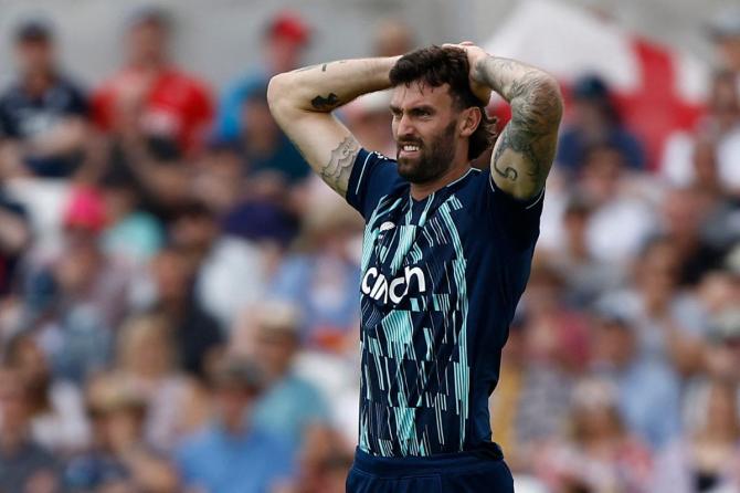 England's Reece Topley reacts