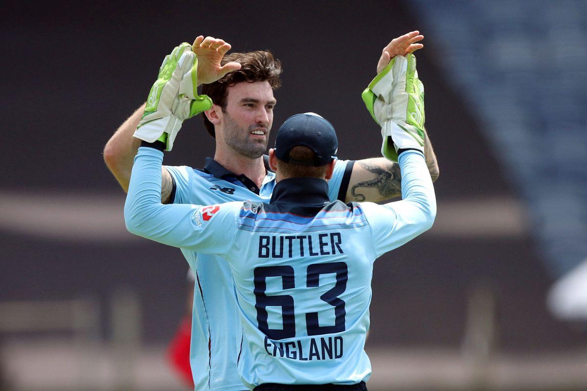 England's Reece Topley celebrates a dismissal 