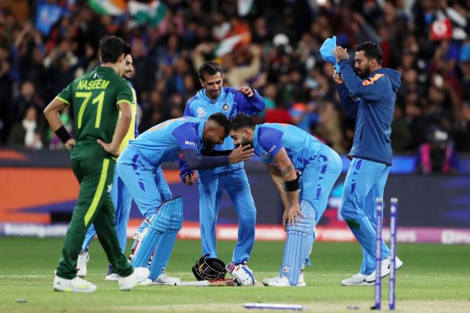 ndia's Virat Kohli and Hardik Pandya celebrate after beating Pakistan by 4 wickets during ICC Men's T20 World Cup 2022 Super 12 Group 2 match