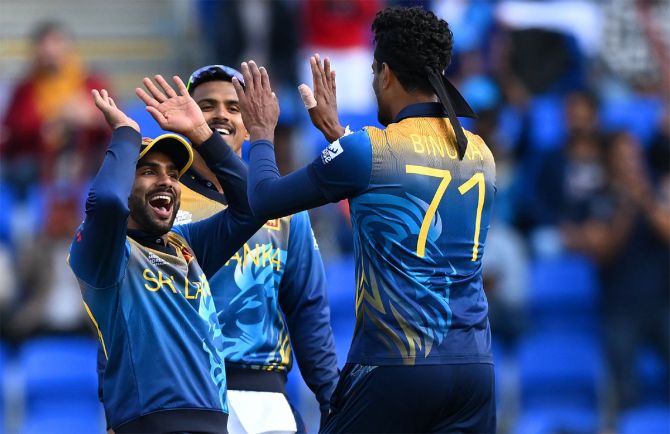 Sri Lanka's players celebrate the fall of an Ireland wicket during the T20 World Cup match in Hobart on Sunday.