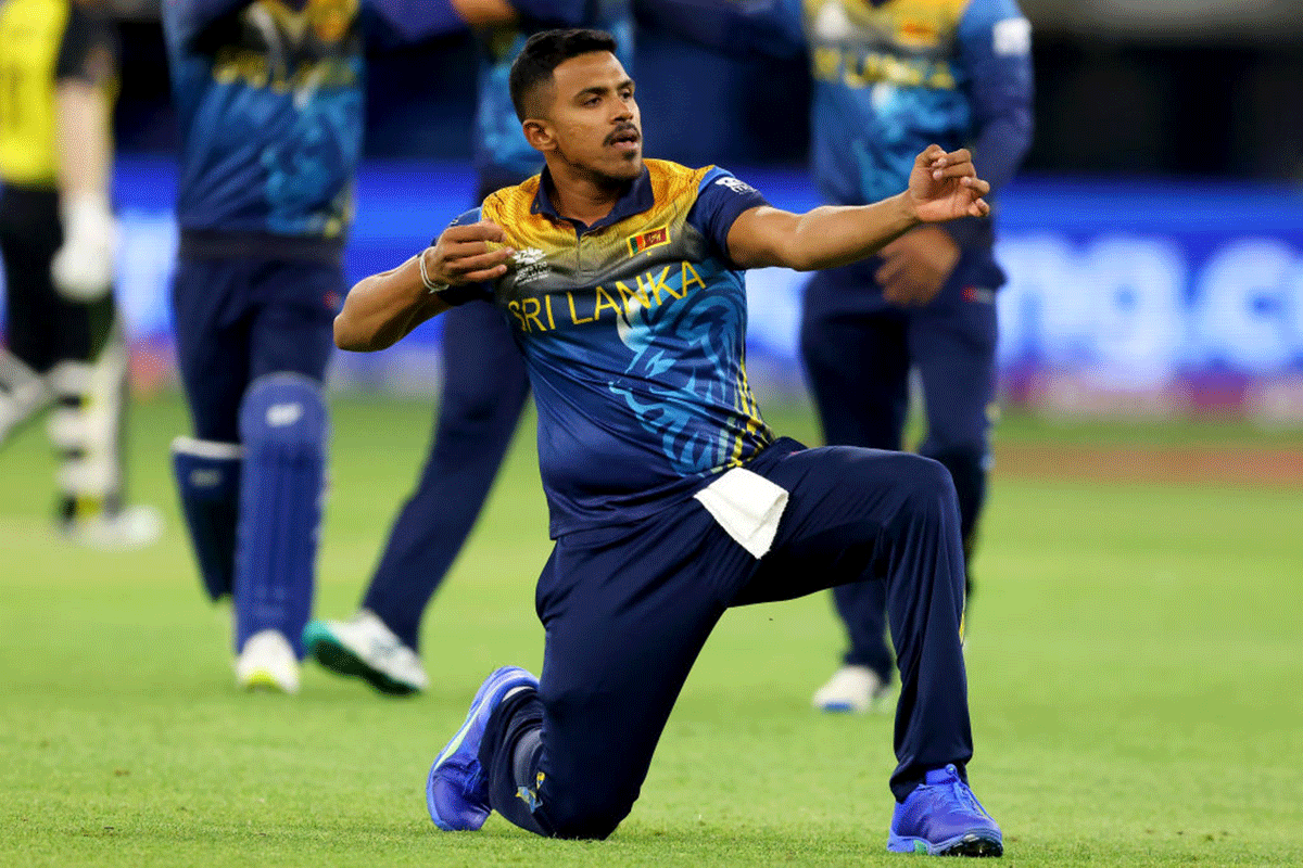 Sri Lanka's Maheesh Theekshana of Sri Lanka celebrates his wicket of David Warner