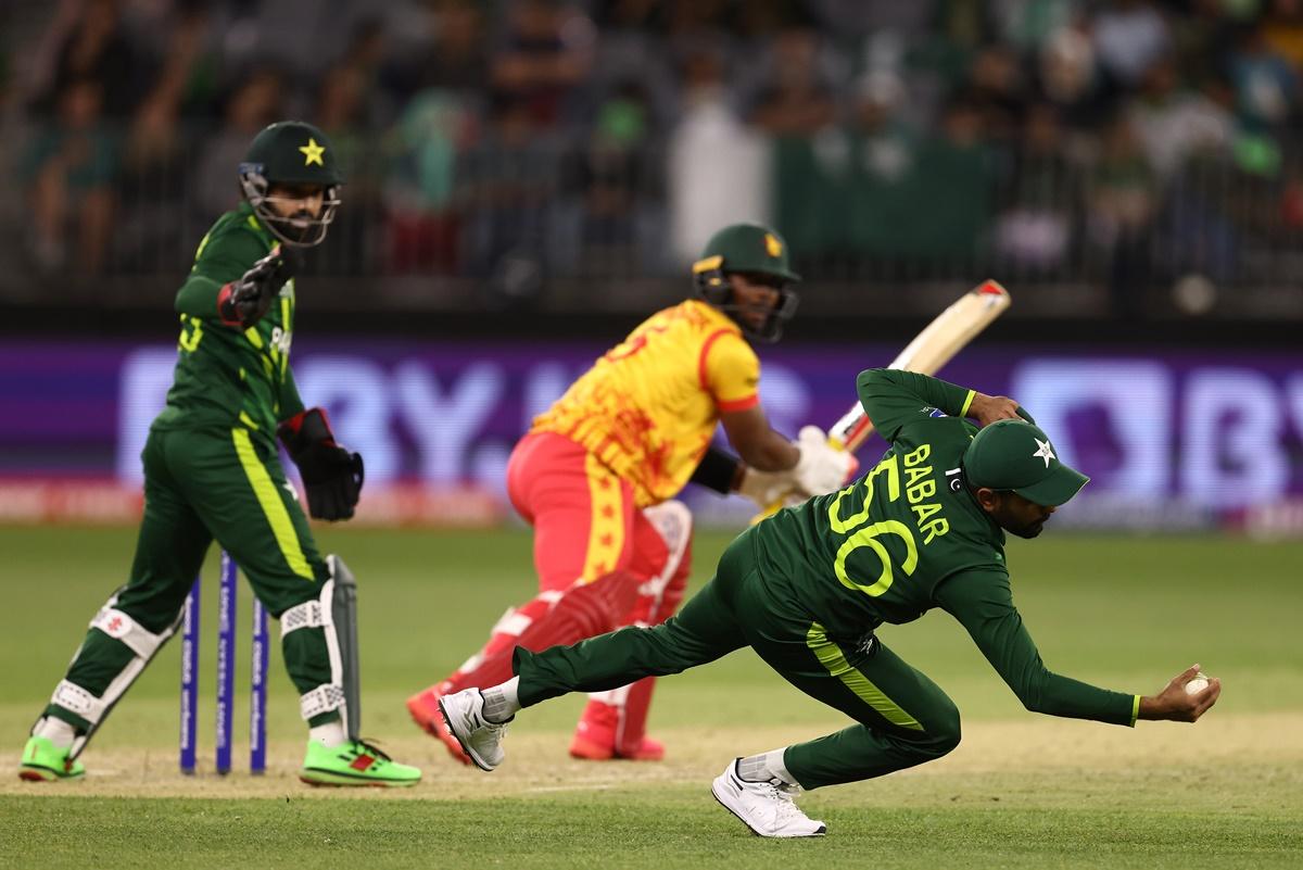 Babar Azam takes the catch to dismss Regis Chakabva