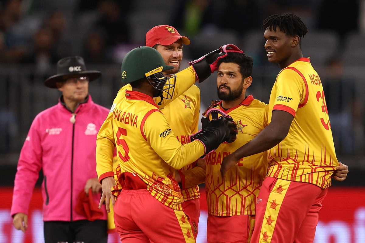 Sikandar Raza is congratulated by his Zimbabwe teammates  after trapping Haider Ali leg before wicket during the T20 World Cup Super 12 match against Pakistan in Perth on Thursday.