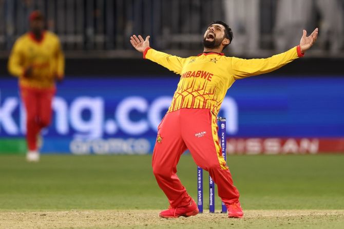 Zimbabwe spinner Sikandar Raza celebrates the wicket of Pakistan's Shadab Khan during the T20 World Cup match at Perth Stadium, in Perth, Australia, on Thursday.