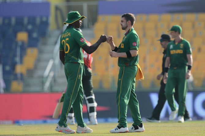 South Africa pacers Anrich Nortje, right, and Kagiso Rabada
