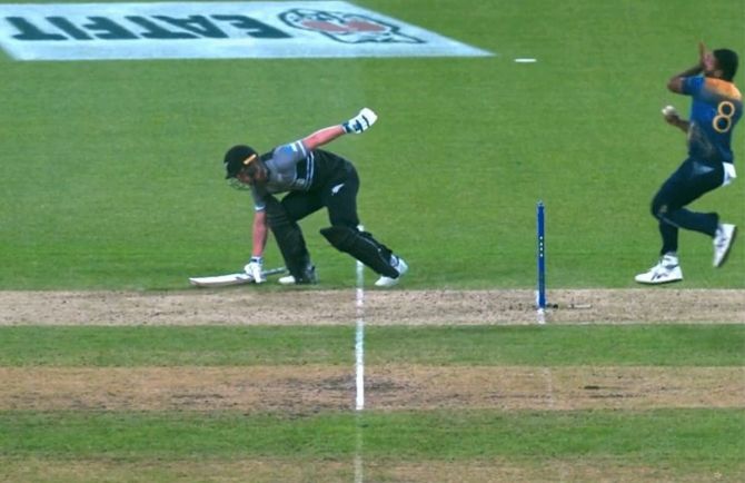 New Zealand's Glenn Phillips crouches at the non-striker's end like a sprinter on starting blocks during the T20 World Cup Super 12 match against Sri Lanka in Sydney on Saturday.