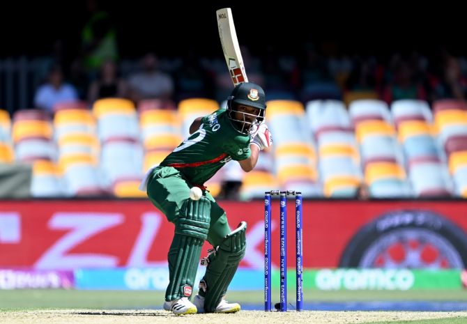 Bangladesh opener Najmul Hossain Shanto hits a four during the T20 World Cup Super 12 match against Zimbabwe, at The Gabba, in Brisbane, on Sunday.