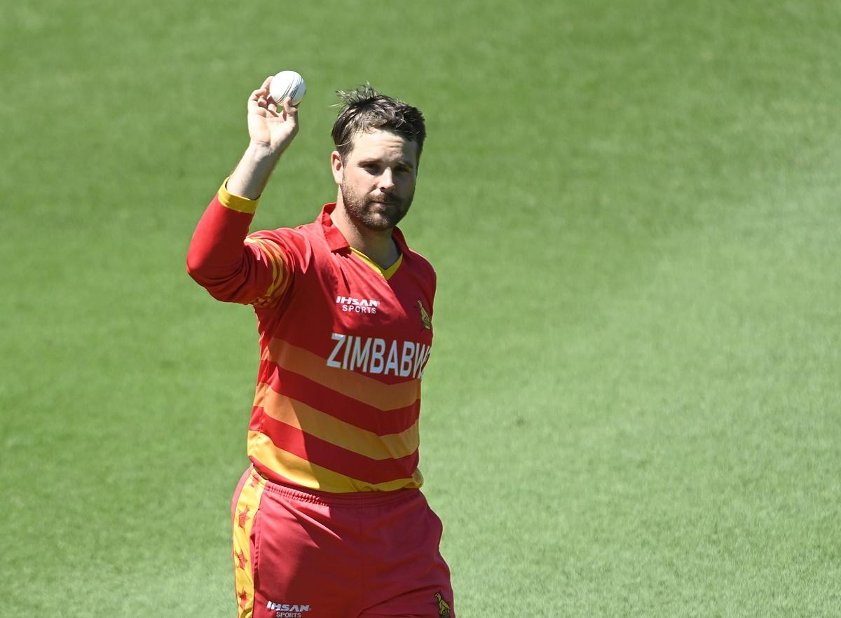 Zimbabwe leg-spinner Ryan Burl walks off the field after taking five wickets in the third One Day International against Australia, at Riverway Stadium in Townsville, Australia, on Saturday.