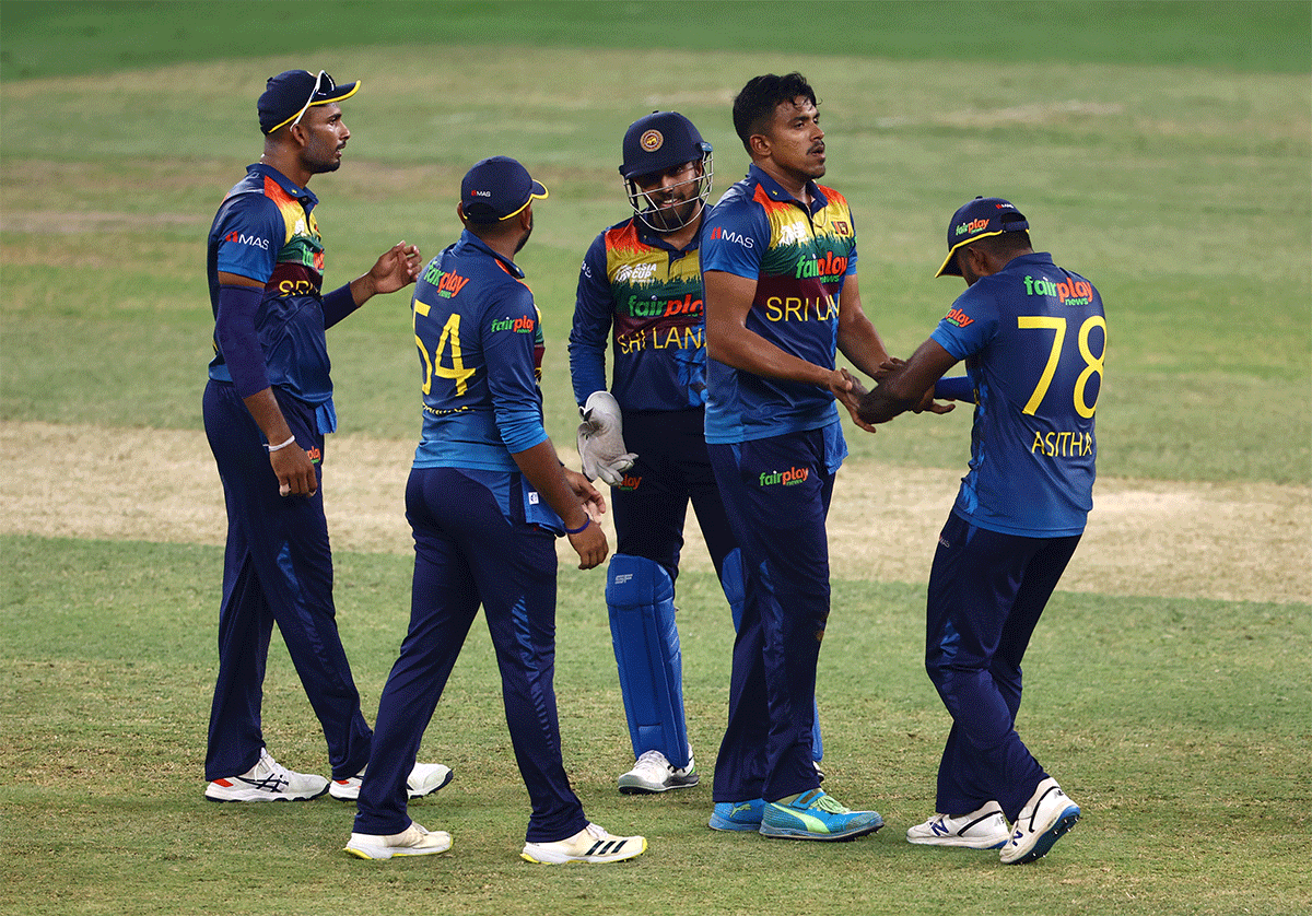 Sri Lanka players celebrate an Afghan wicket