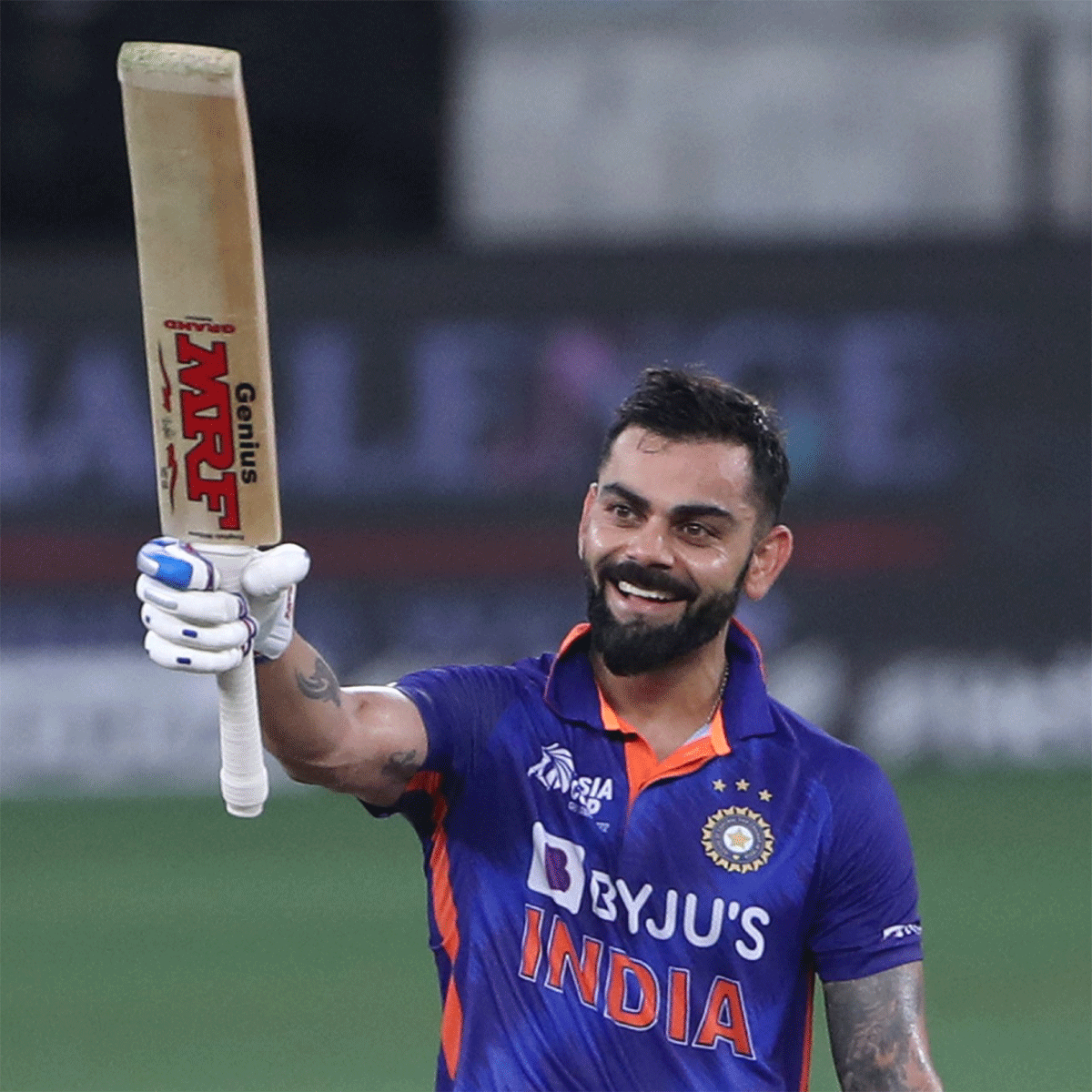 Virat Kohli celebrates on scoring his 1st 20I century, his 71st in international cricket, during the Asia Cup match in Dubai on Thursday