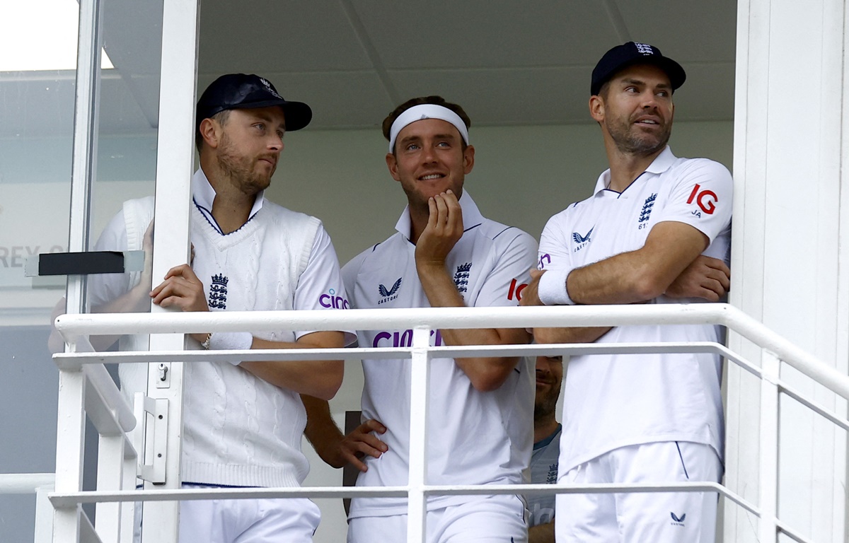 England's Ollie Robinson, Stuart Broad and James Anderson watch from the balcony as rain plays spoilsport on Day 1 of the third Test against South Africa at The Oval, London, on Thursday.