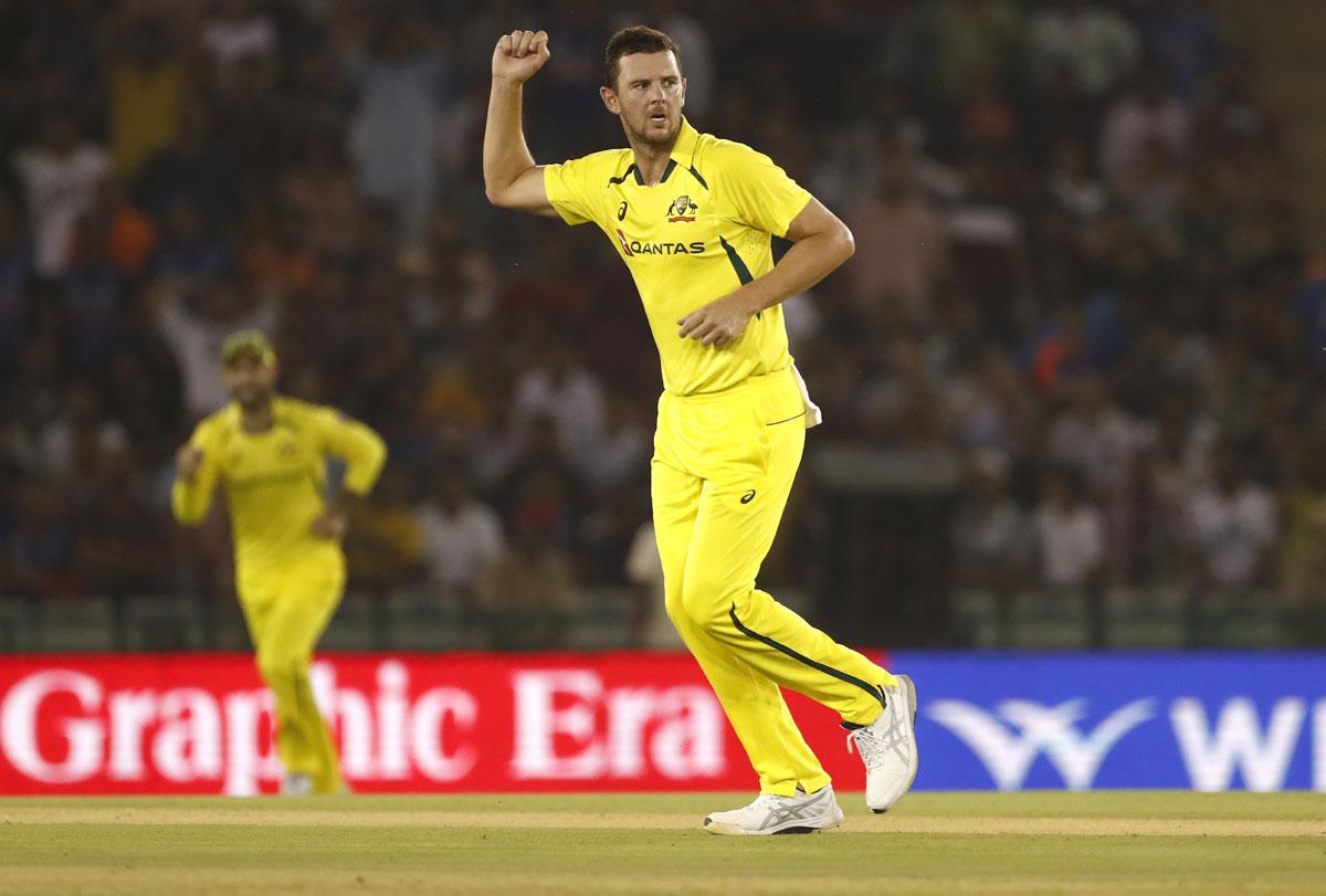 Josh Hazlewood celebrates on dismissing Rohit Sharma