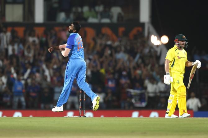 Jasprit Bumrah celebrates on crashing into Aaron Finch's stumps