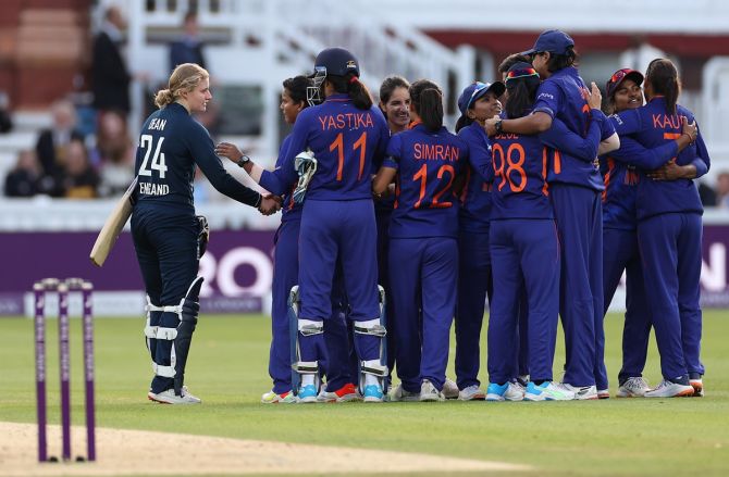 England batter Charlie Dean speaks with India's players after being controversially run-out by Deepti Sharma in the third women's ODI at Lord's on Saturday