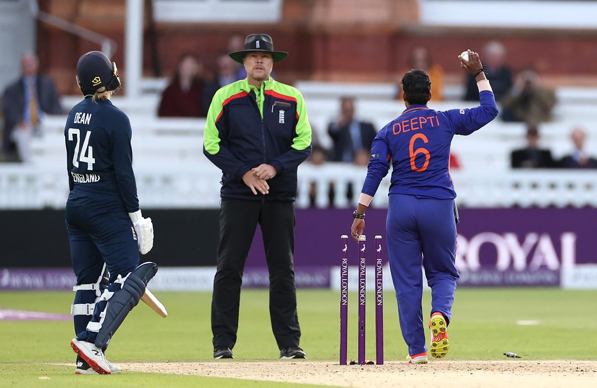 England's top-scorer Charlie Dean reacts after being run-out by Deepti Sharma.