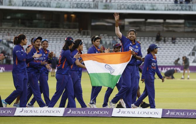 Jhulan Goswami and her teammates celebrate after India's 16-run victory over England in the third ODI at Lord's on Saturday.