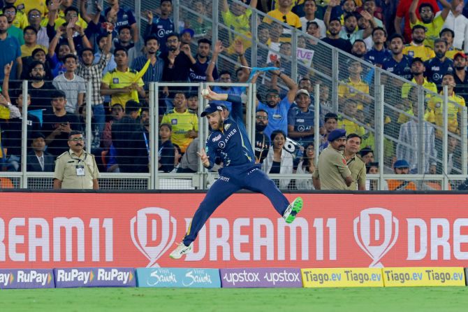 Kane Williamson catches Chennai Super Kings opener Ruturaj Gaikwad just ahead of the boundary line during the IPL 2023 opener in Ahmedabad on Friday. 