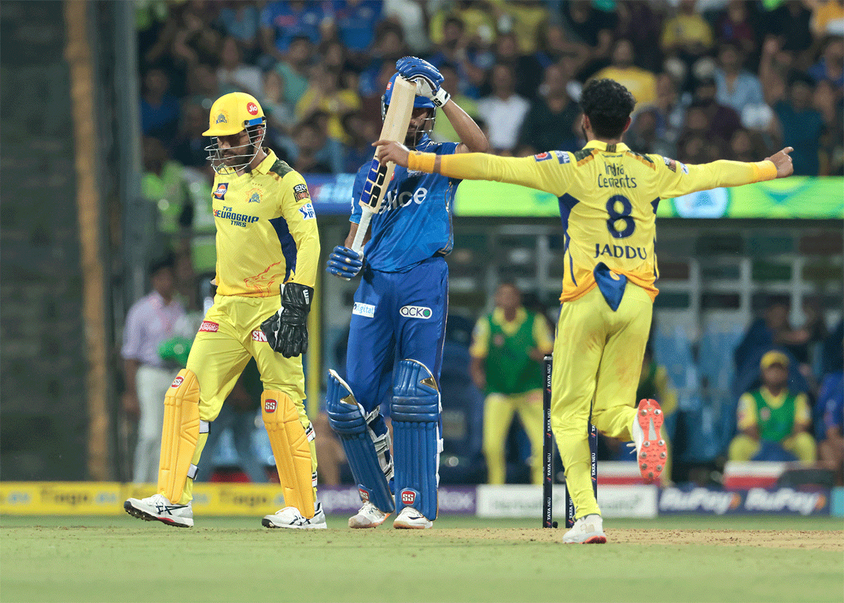 Ravindra Jadeja celebrates the wicket of Tilak Verma