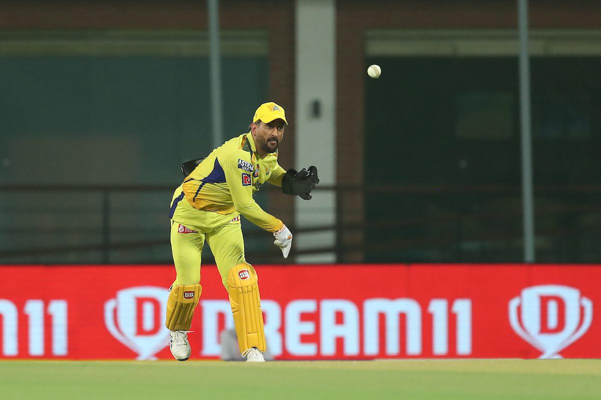 Mahendra Singh Dhoni, standing way behind the stumps, throws the ball and hits the stumps to run-out SunRisers Hyderabad's Washington Sundar