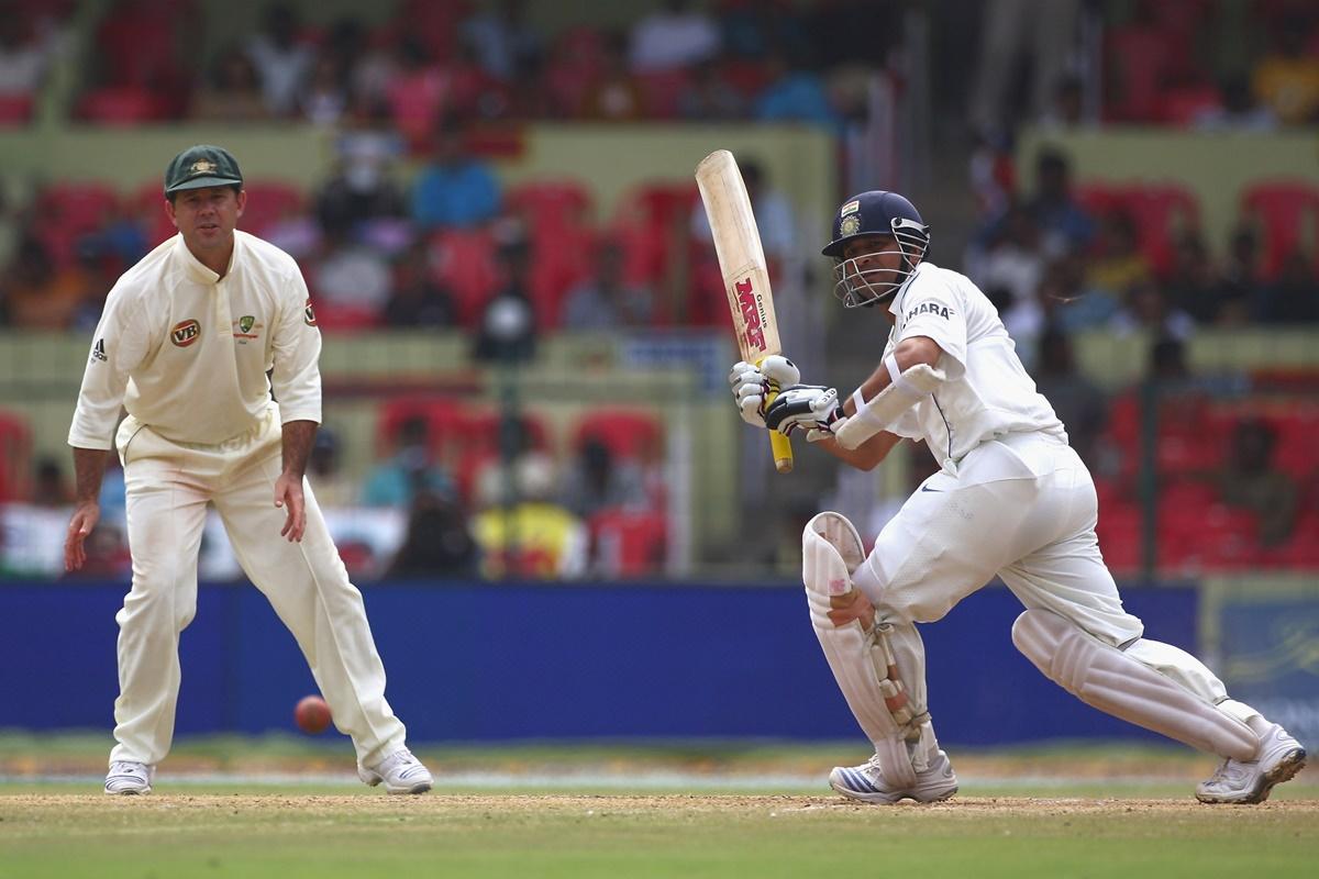 Ricky Ponting watches as Sachin Tendulkar plays to leg side during the first Test between India and Australia at the M.Chinnaswamy stadium, in Bangalore, on October 13, 2008.