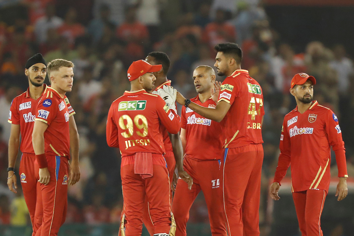 Punjab Kings players heave a sigh of relief after Lucknow Super Giants opener Kyle Mayers is caught by Shikhar Dhawan off the bowling of Kagiso Rabada  during the Indian Premier League match in Mohali on Friday.