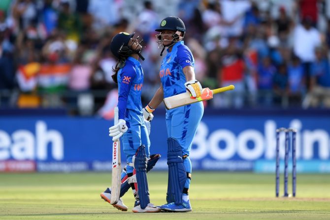 Jemimah Rodrigues and Richa Ghosh celebrate following India's victory over Pakistan in the the ICC women's T20 World Cup Group B match at Newlands Stadium in Cape Town, South Africa, on Sunday.