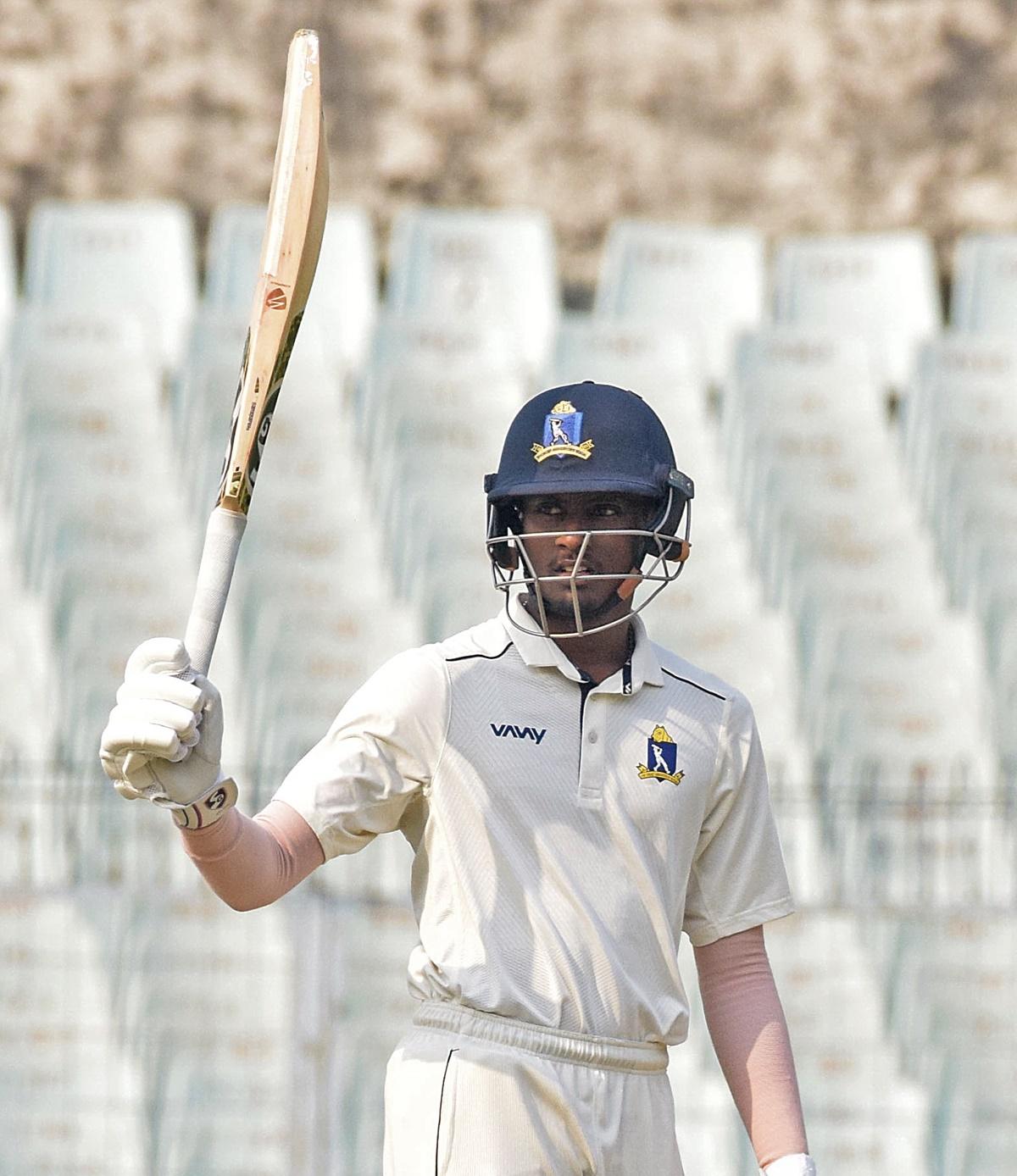 Bengal's Abishek Porel celebrates his half-century on Day 1 of the Ranji Trophy final against Saurashtra, at the Eden Gardens, in Kolkata, on Thursday.