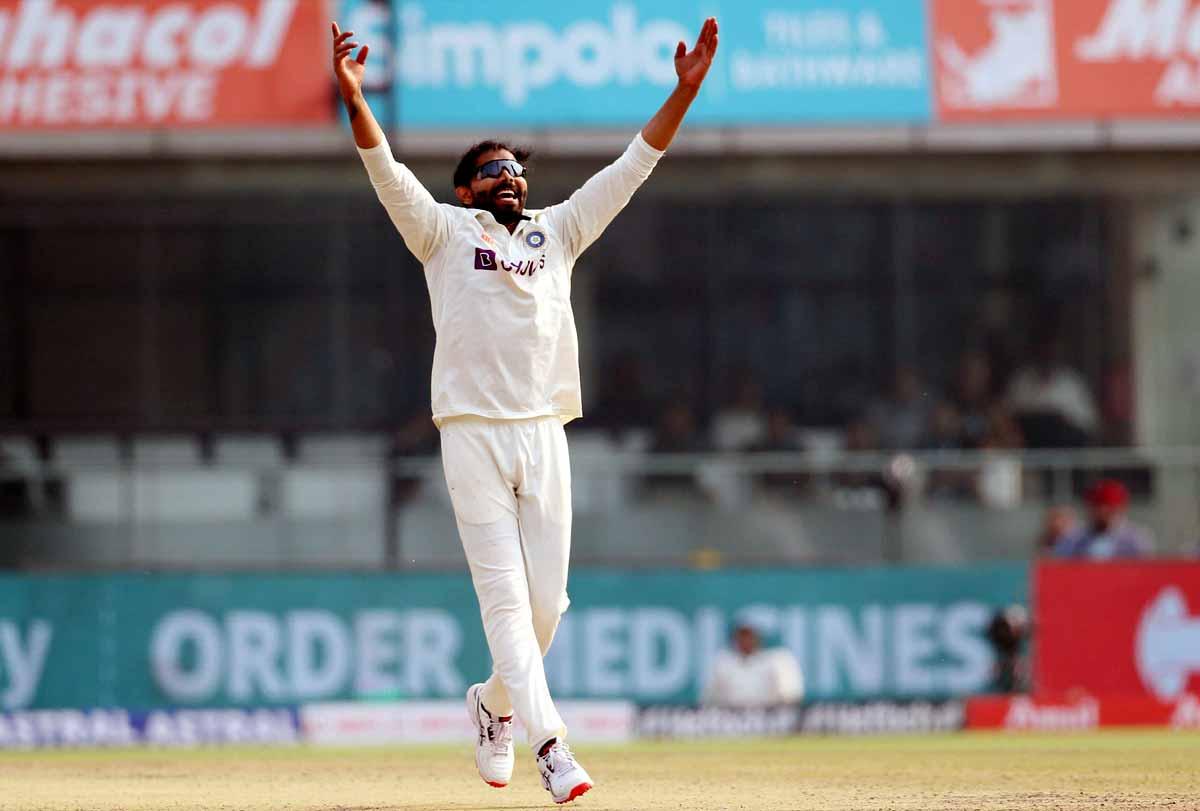 Ravindra Jadeja celebrates the wicket of Pat Cummins.