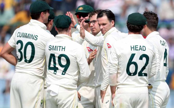 Todd Murphy celebrates the wicket of Ravindra Jadeja.