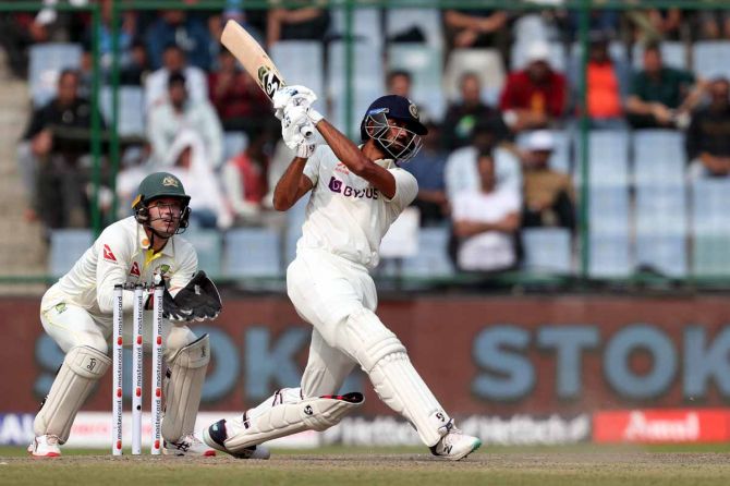 Axar Patel hits a six during his 115-ball 74 on Day 2 of the second Test against Australia at the Arun Jaitley stadium in Delhi, on Saturday.