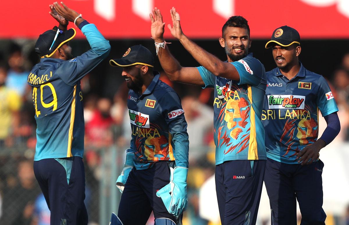 Dasun Shanaka celebrates with team-mates after taking the wicket of Shubman Gill