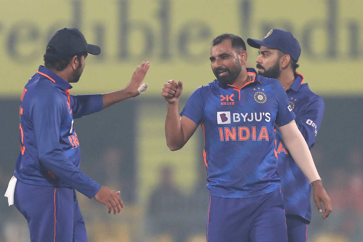 Shami and Rohit celebrate a wicket