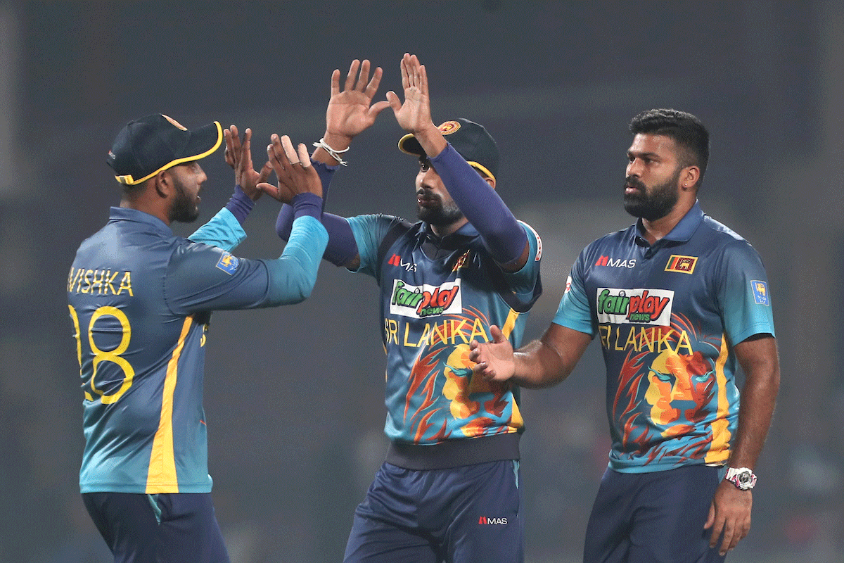 Sri Lanka's Chamika Karunaratne celebrates the wicket of India captain Rohit Sharma 