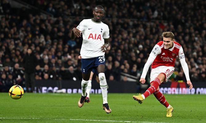 Martin Odegaard scores Arsenal's second goal during the Premier League match against Tottenham Hotspur, at Tottenham Hotspur Stadium, London, on Sunday.
