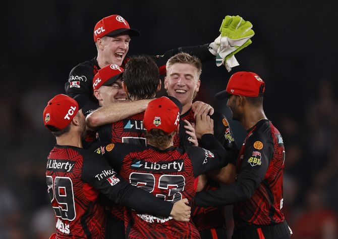 Melbourne Renegades players celebrate victory over Melbourne Stars in the Big Bash League match, at Marvel Stadium, in Melbourne, Australia, on Saturday.