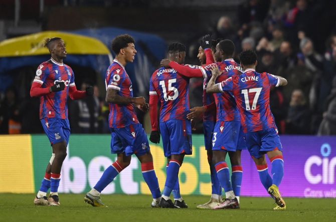Selhurst Park, London, Britain - January 18, 2023  Michael Olise celebrates with his Crystal Palace teammates after finding the equaliser. 