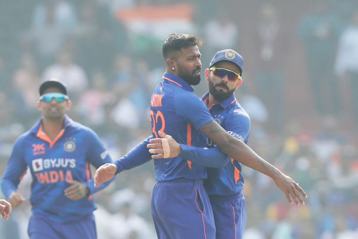 Hardik Pandya celebrates with Virat Kohli after dismissing Devon Conway.