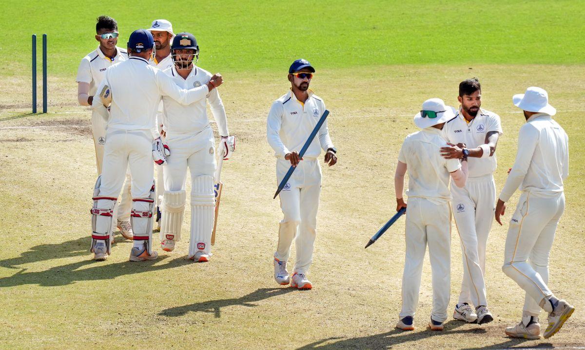 Tamil Nadu's players celebrate after winning their Ranji Trophy match against Saurashtra, in Chennai, Friday.