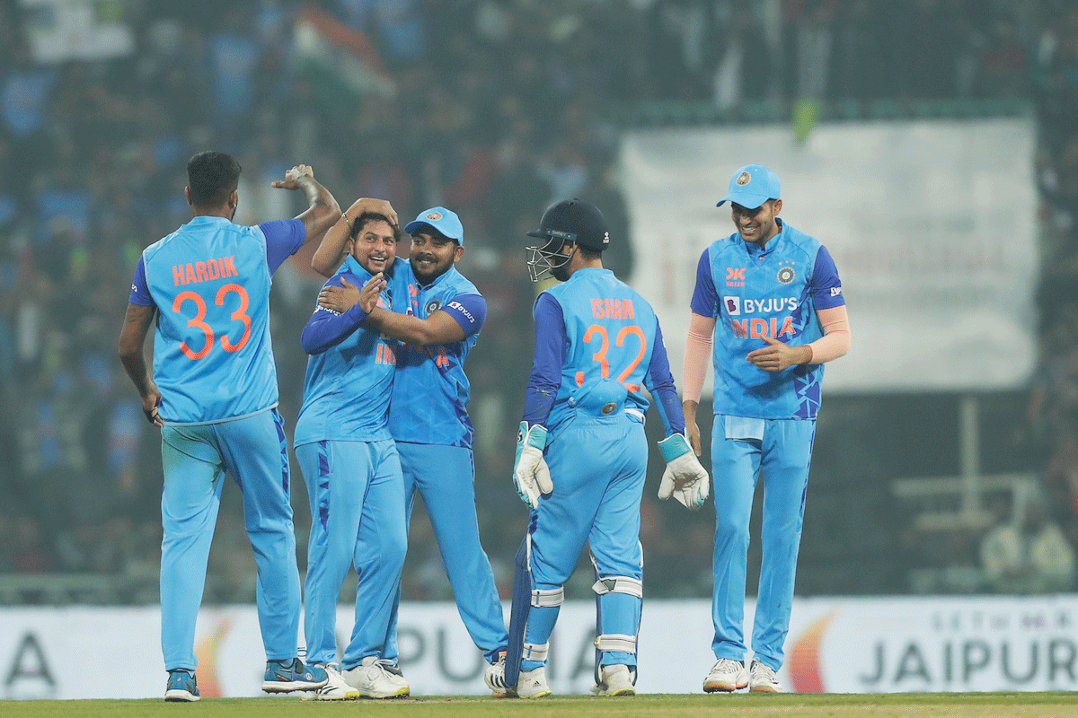 Kuldeep Yadav celebrates dismissing Daryl Mitchell during the second T20 International against New Zealand in Lucknow on Sunday.
